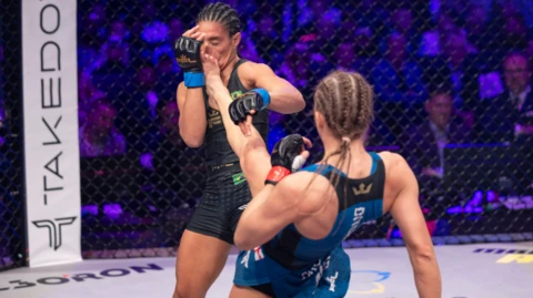 Dakota Ditcheva lands a front kick to the face