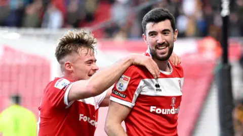 Ben Doak (left) congratulates Finn Azaz on scoring Middlesbrough's opening goal