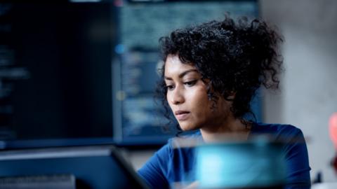 Women works at a computer