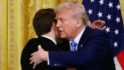 Image shows Trump and Macron