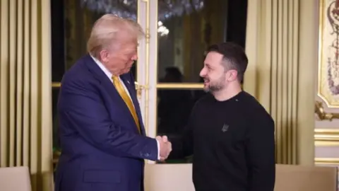 Trump and Zelensky shaking hands