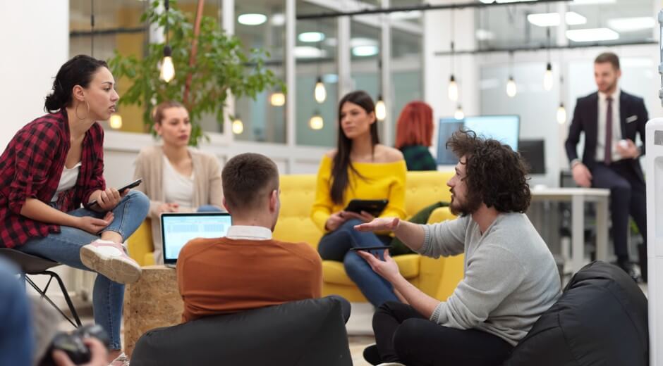 Many professionals having a meeting together in the office
