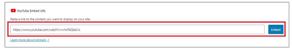 A YouTube embed tool displaying a field to paste a video URL, with an 'Embed' button highlighted.