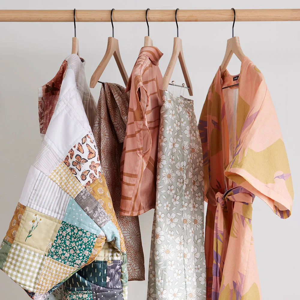 Rack of me-made handsewn apparel items