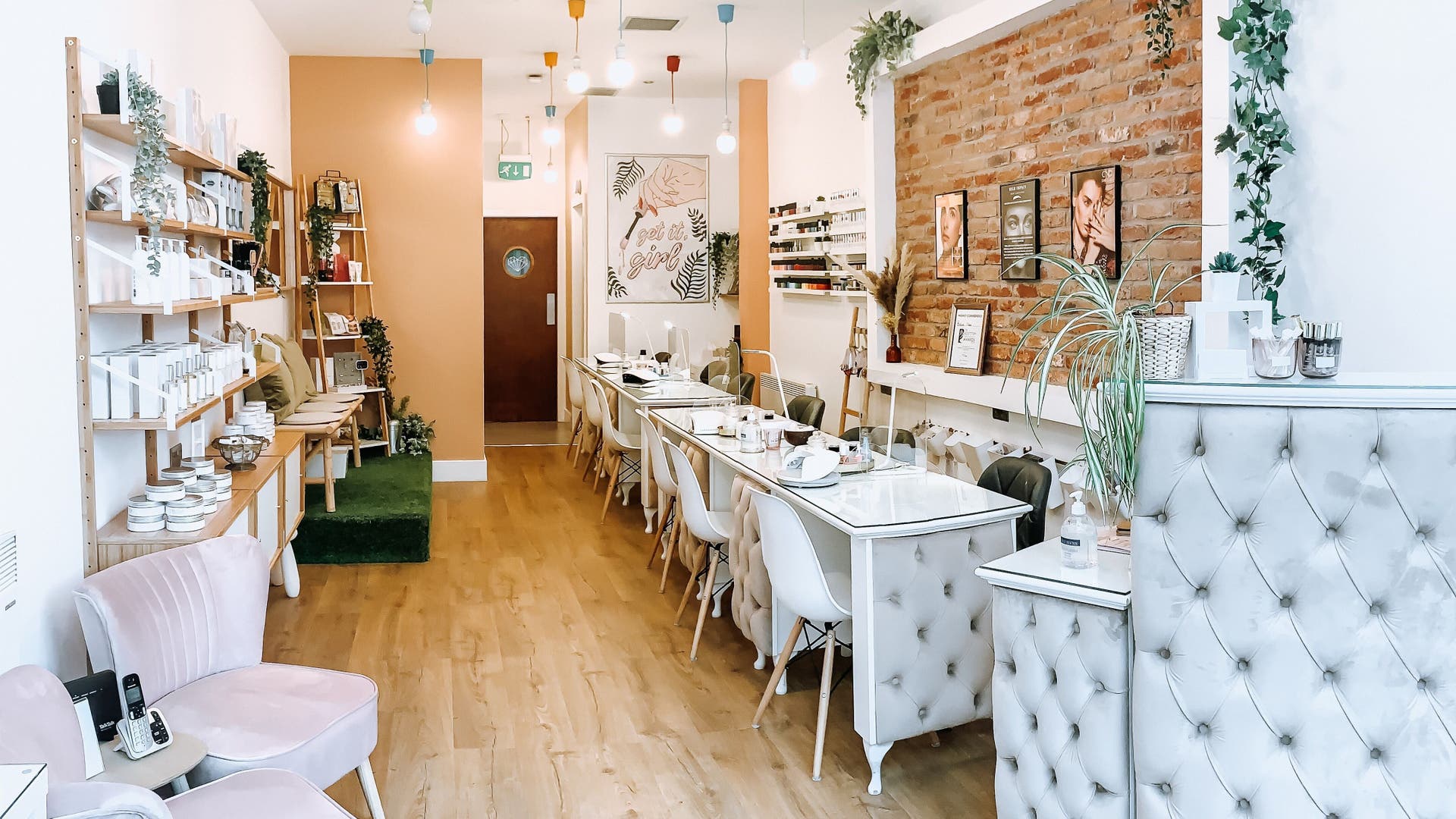 Interior of Bellini Nails and Beauty in Glasgow, Scotland, GB. Elegant nail salon with cozy seating and stylish decor.