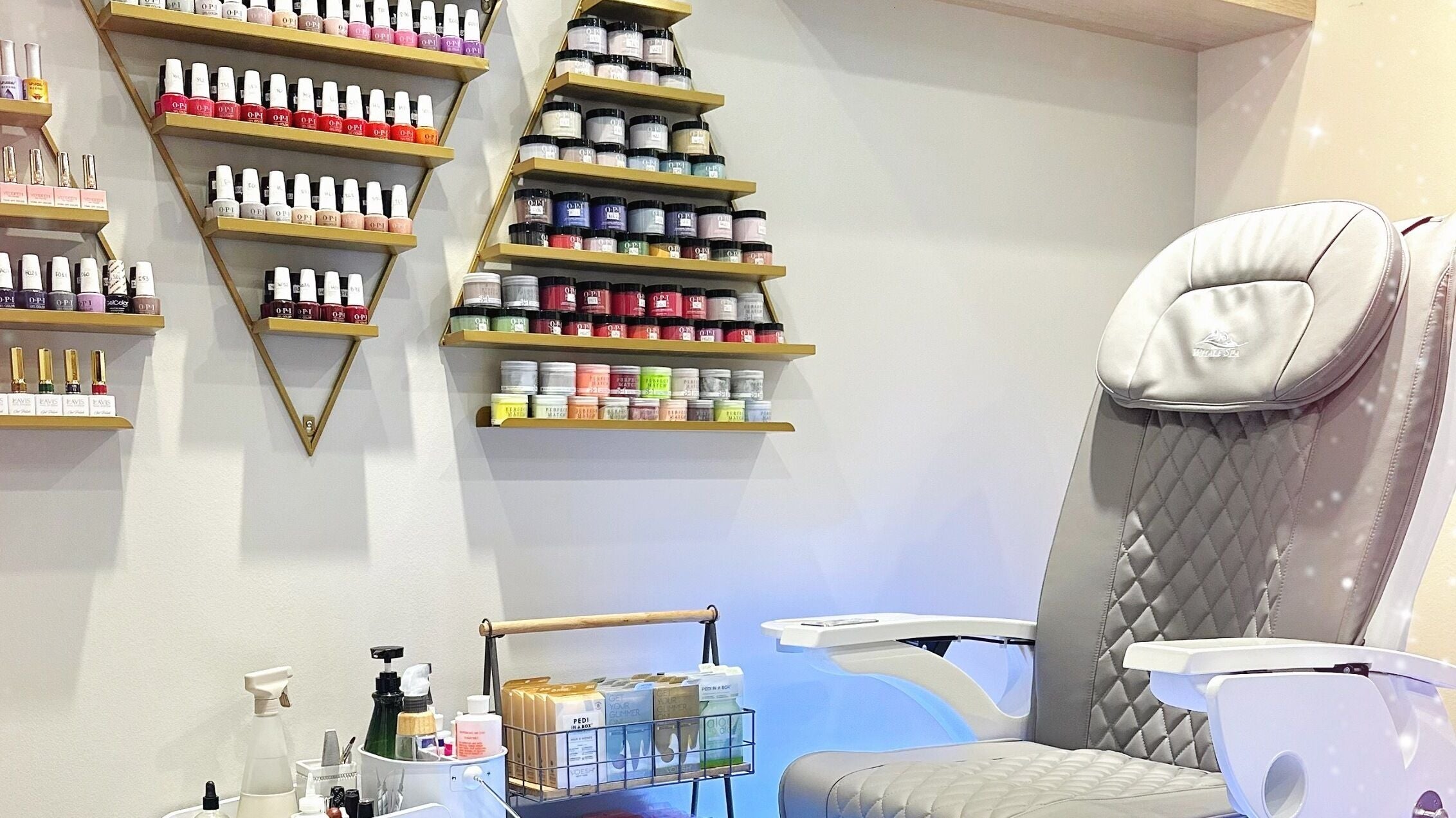 Glam E Nails salon in Arlington, Virginia, US features a luxurious pedicure chair and vibrant polish selection.