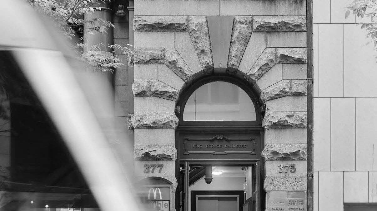 Elegant stone facade of True Cut Barber Studio in Sydney, New South Wales, AU.