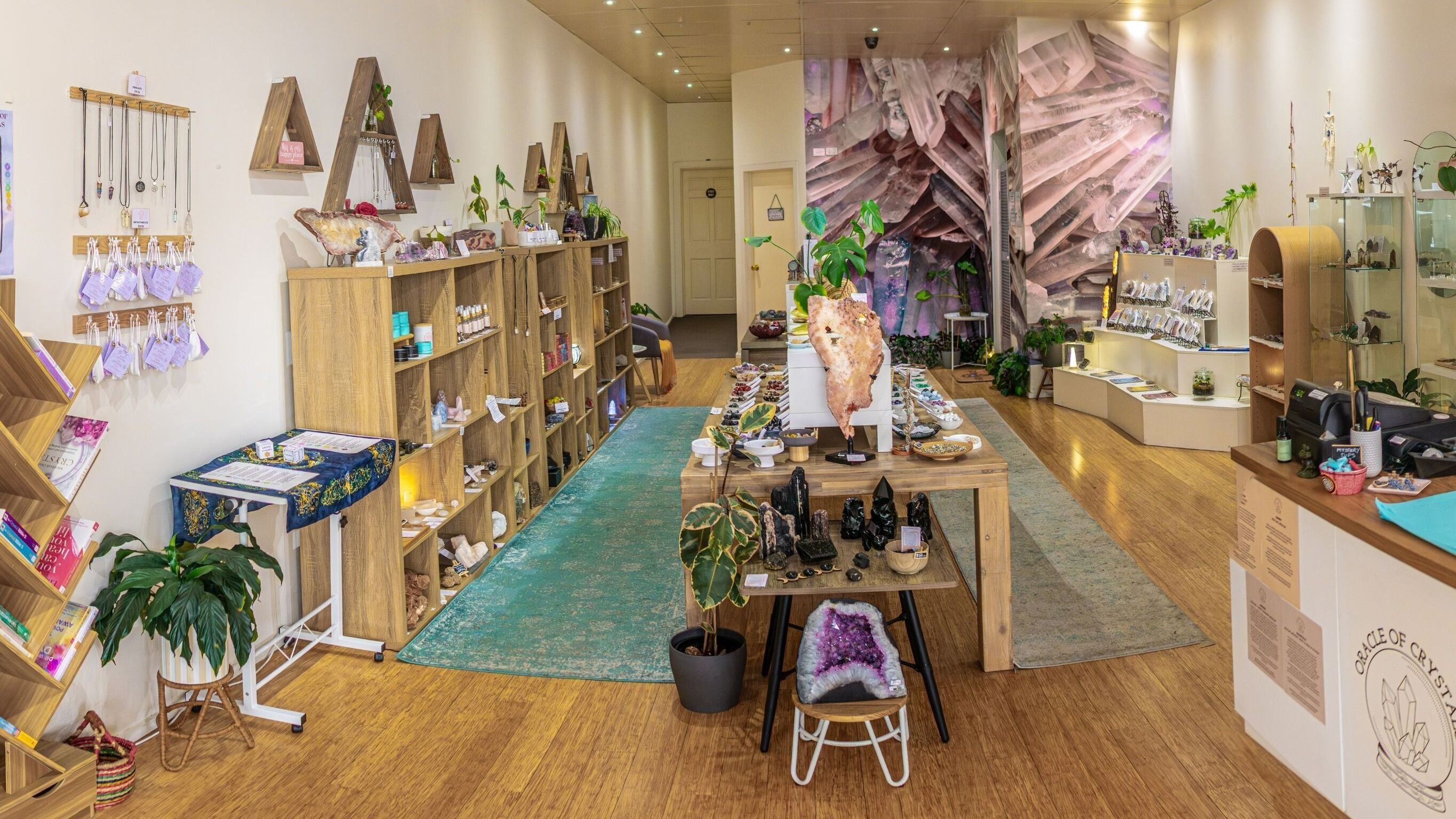 Interior view of Oracle of Crystals shop in Melbourne, Victoria, AU displaying crystal collections and wellness items.