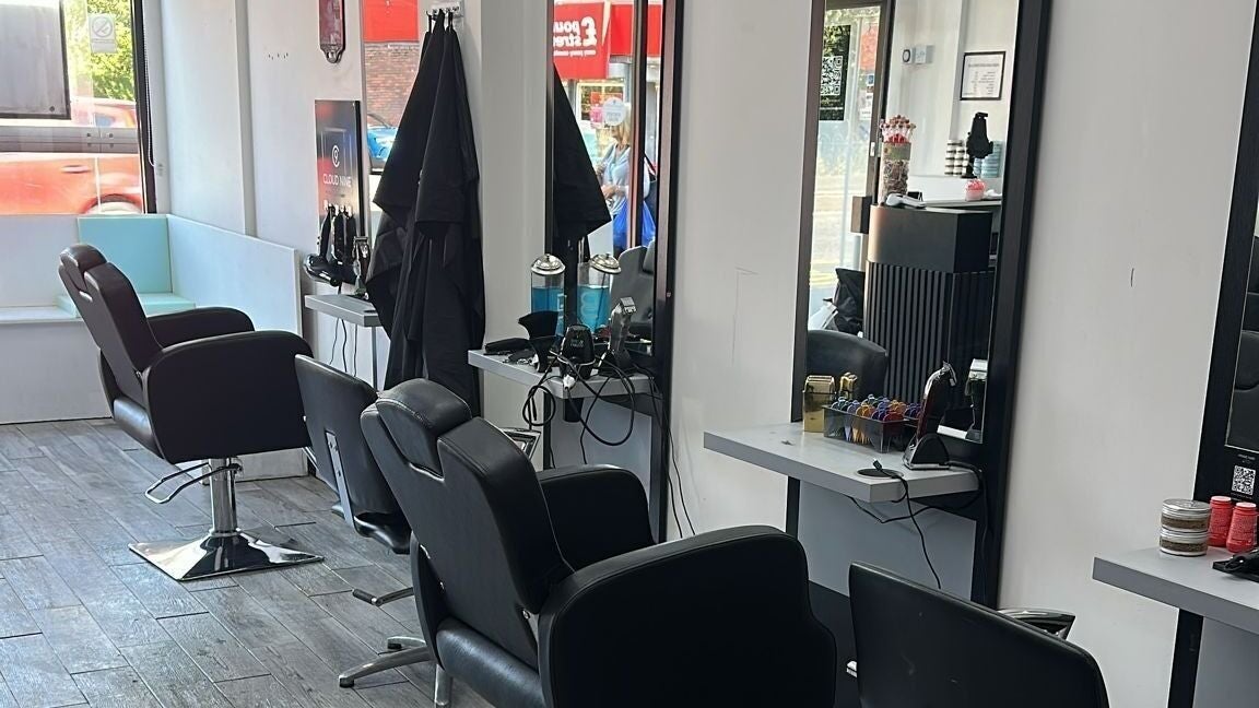 Modern styling stations at Prime Hair, Glasgow, Scotland, GB, offering premium salon services.