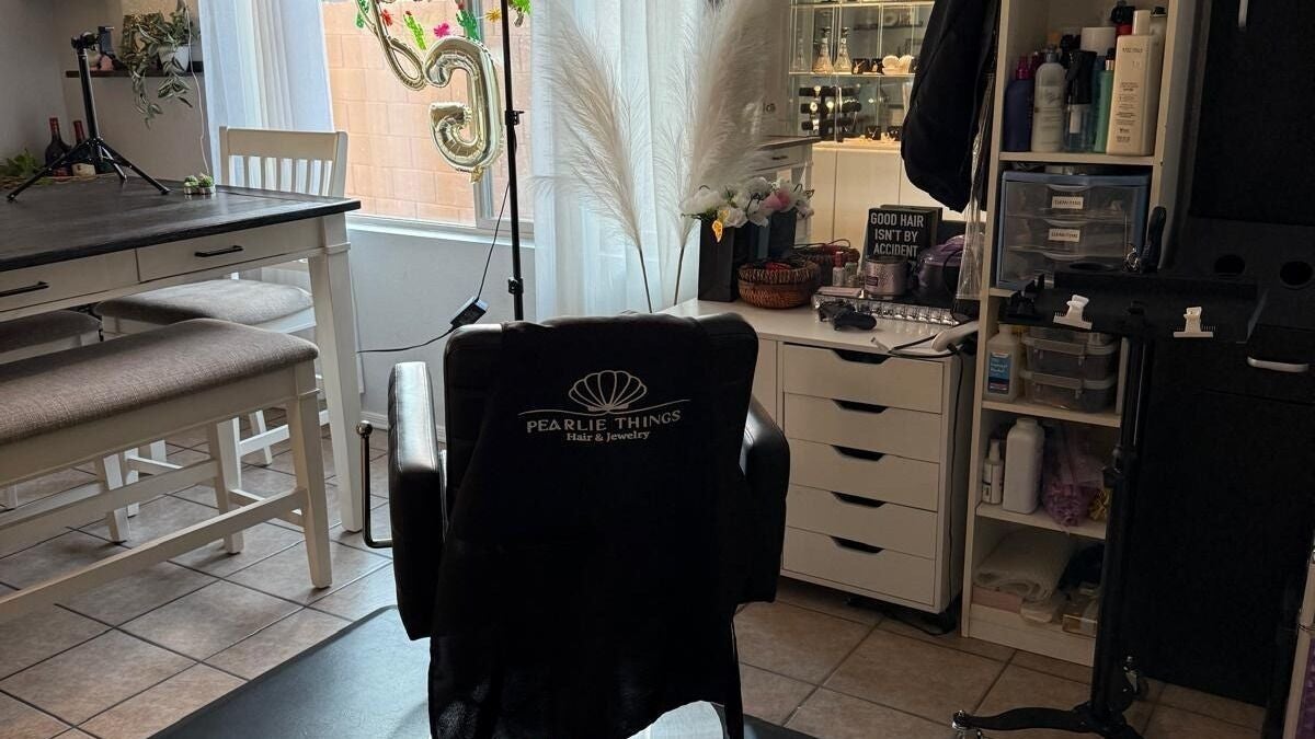 Modern interior of Pearlie Things salon in Phoenix, Arizona, US, featuring stylish seating and beauty products.