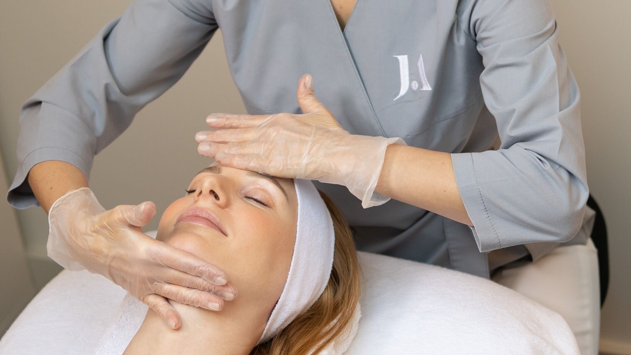 Relaxing facial massage at Fitzrovia Aesthetics, London, England, GB. Experience soothing wellness treatments.