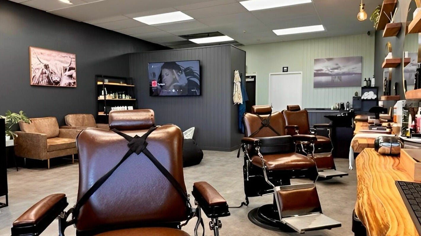 Interior of Barber Bros, Tauranga, Bay of Plenty, NZ featuring stylish barber chairs and modern decor.