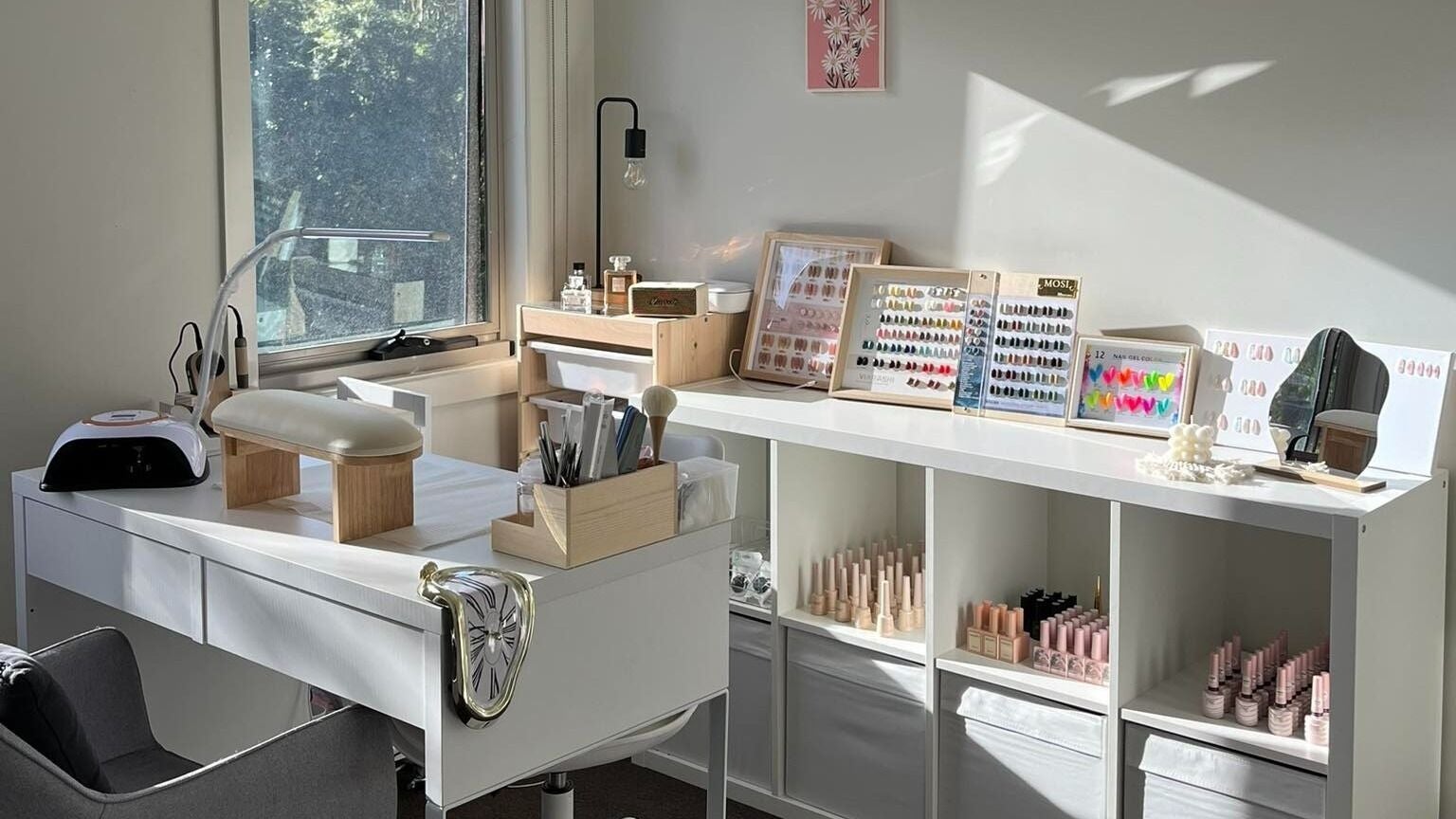 Bright nail salon space at 墨爾本美甲 Coco Nails, Melbourne, Victoria, AU, showcasing nail polish samples and equipment.