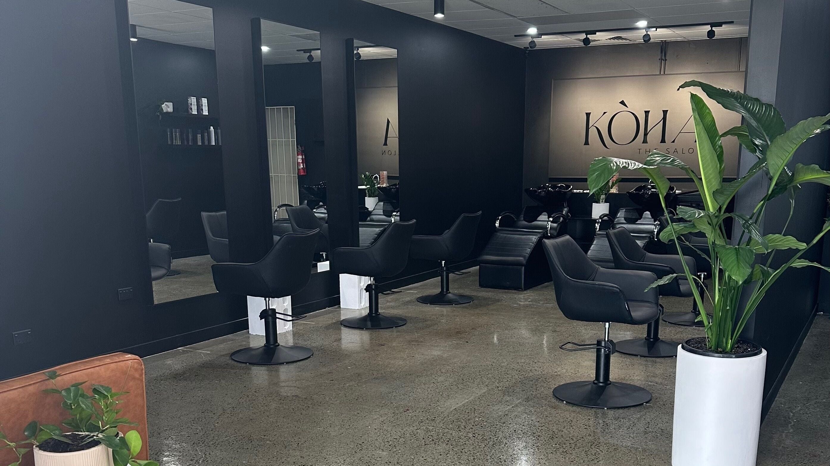 Kōha The Salon SPRINGFIELD's sleek interior with styling chairs in Springfield, Queensland, AU.