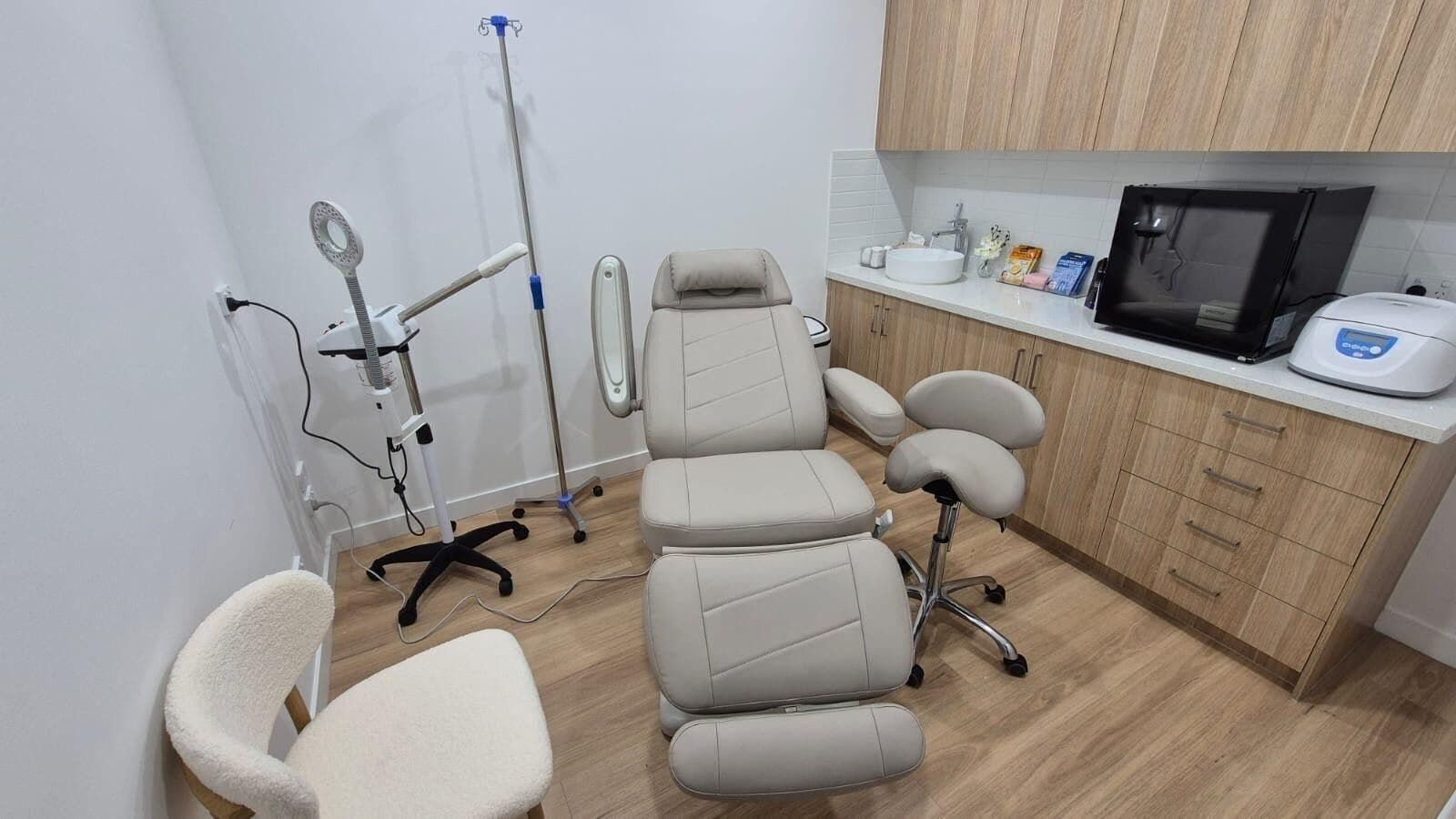 Relaxing spa treatment room at A1 Skin Clinic, Melbourne, Victoria, AU with modern equipment and calming decor.