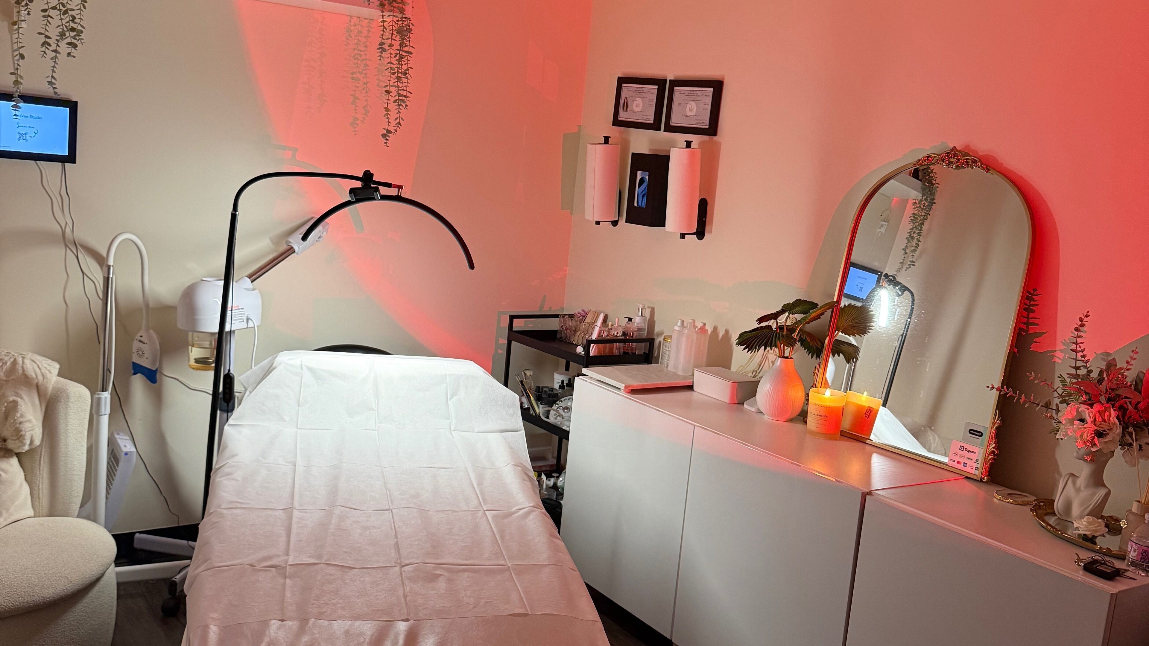 A cozy treatment room at Renew Skin & Laser, White Plains, New York, US, with elegant decor and ambient lighting.