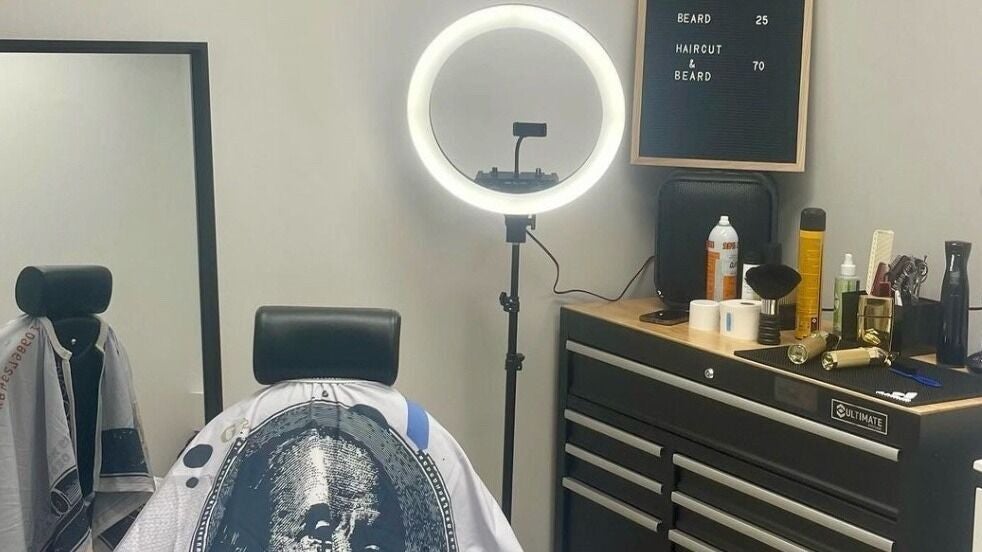Modern grooming setup at Brianblendz, Liverpool, New South Wales, AU with ring light and styling tools.