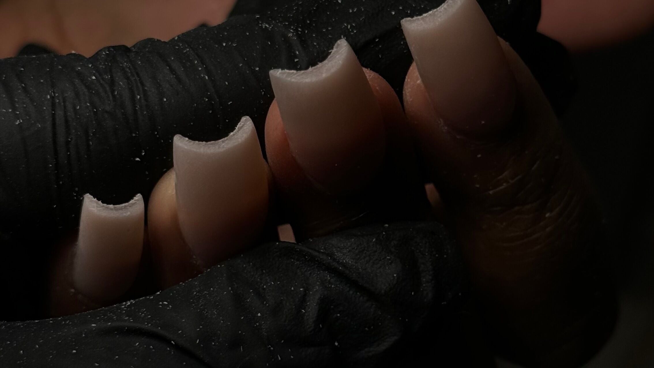 Close-up of manicured nails at Polished Beauty, Atlanta, Georgia, US, showcasing precision nail care.