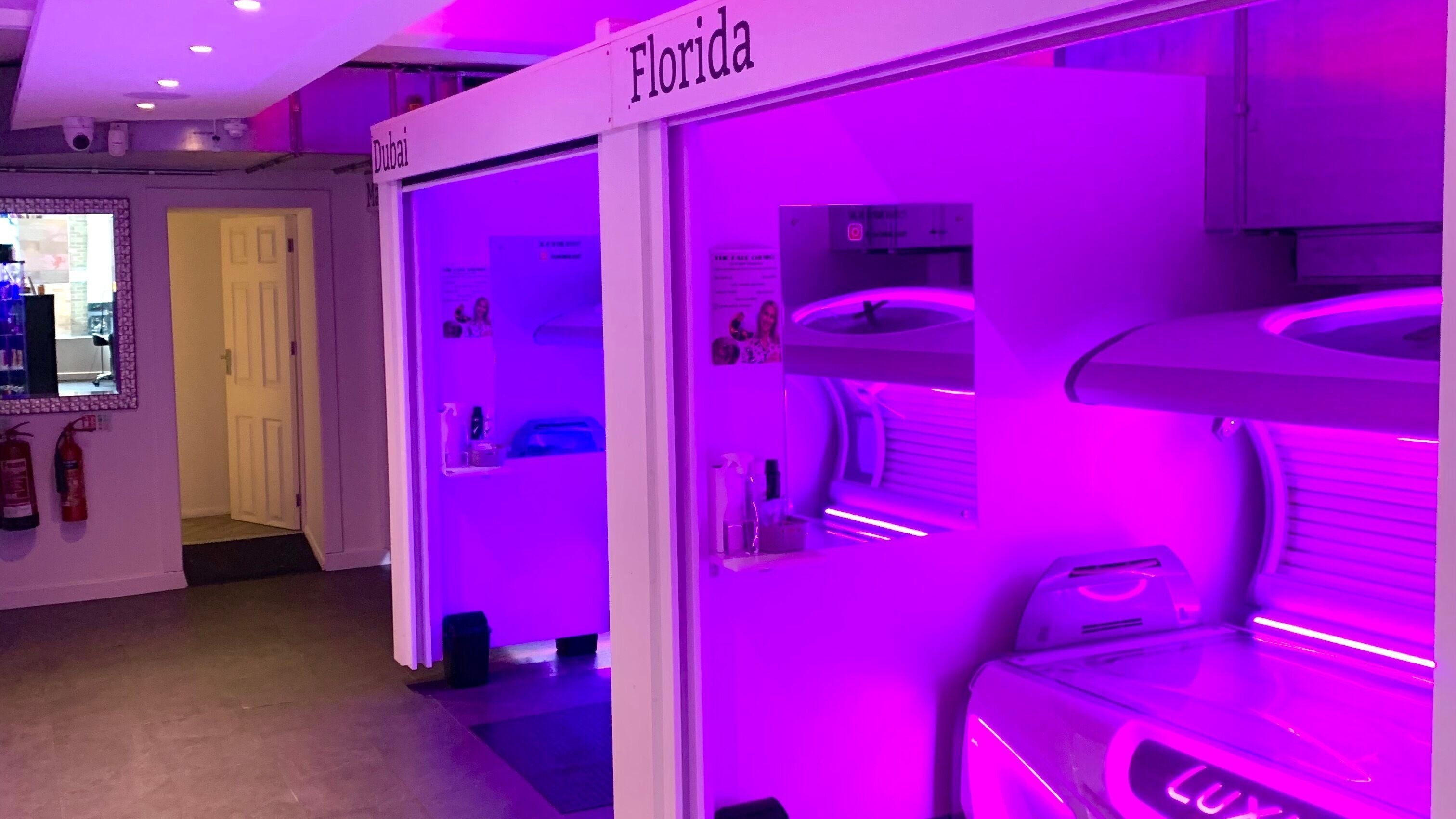 Vibrant tanning booths at Glow Tanning and Beauty, Chelmsford, England, GB.