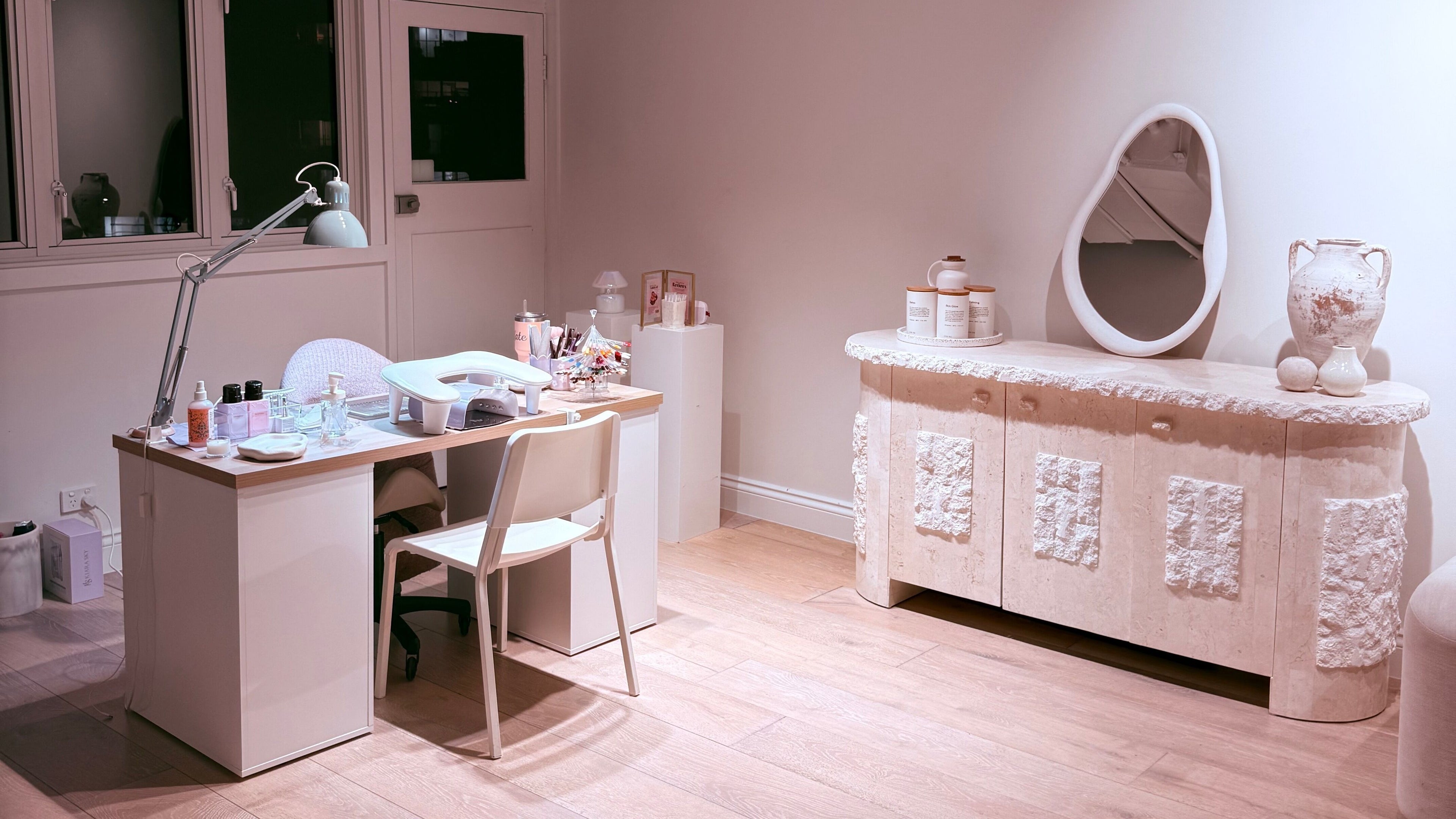 Elegant nail studio at Mirage French Nails in Windsor, Queensland, AU featuring modern furniture and decor.