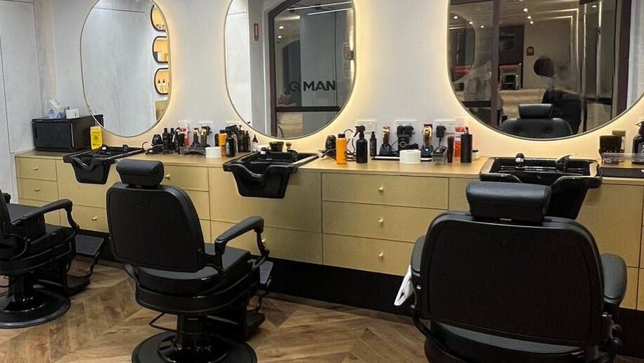 Elegant interior of Q MAN BARBERSHOP - SKIN FADE & BEARD SPECIALIST in Redfern, New South Wales, AU.