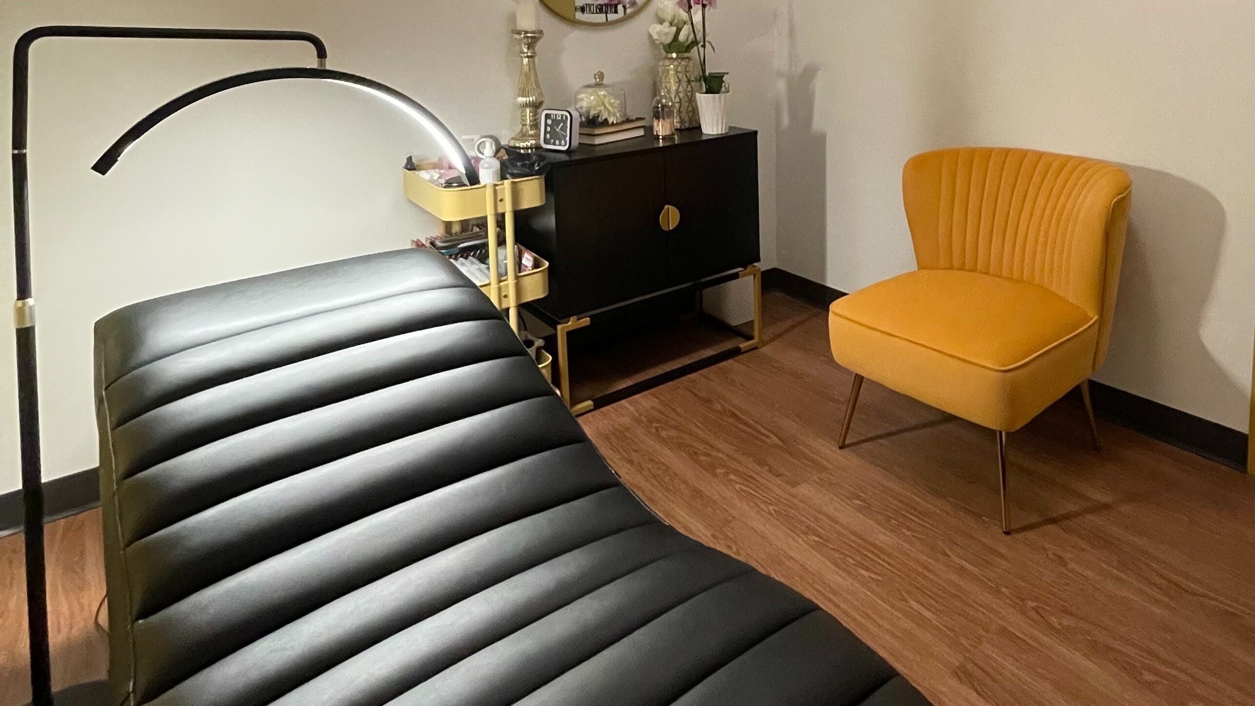 Lash Culture spa room with elegant decor and treatment bed in Calgary, Alberta, CA.