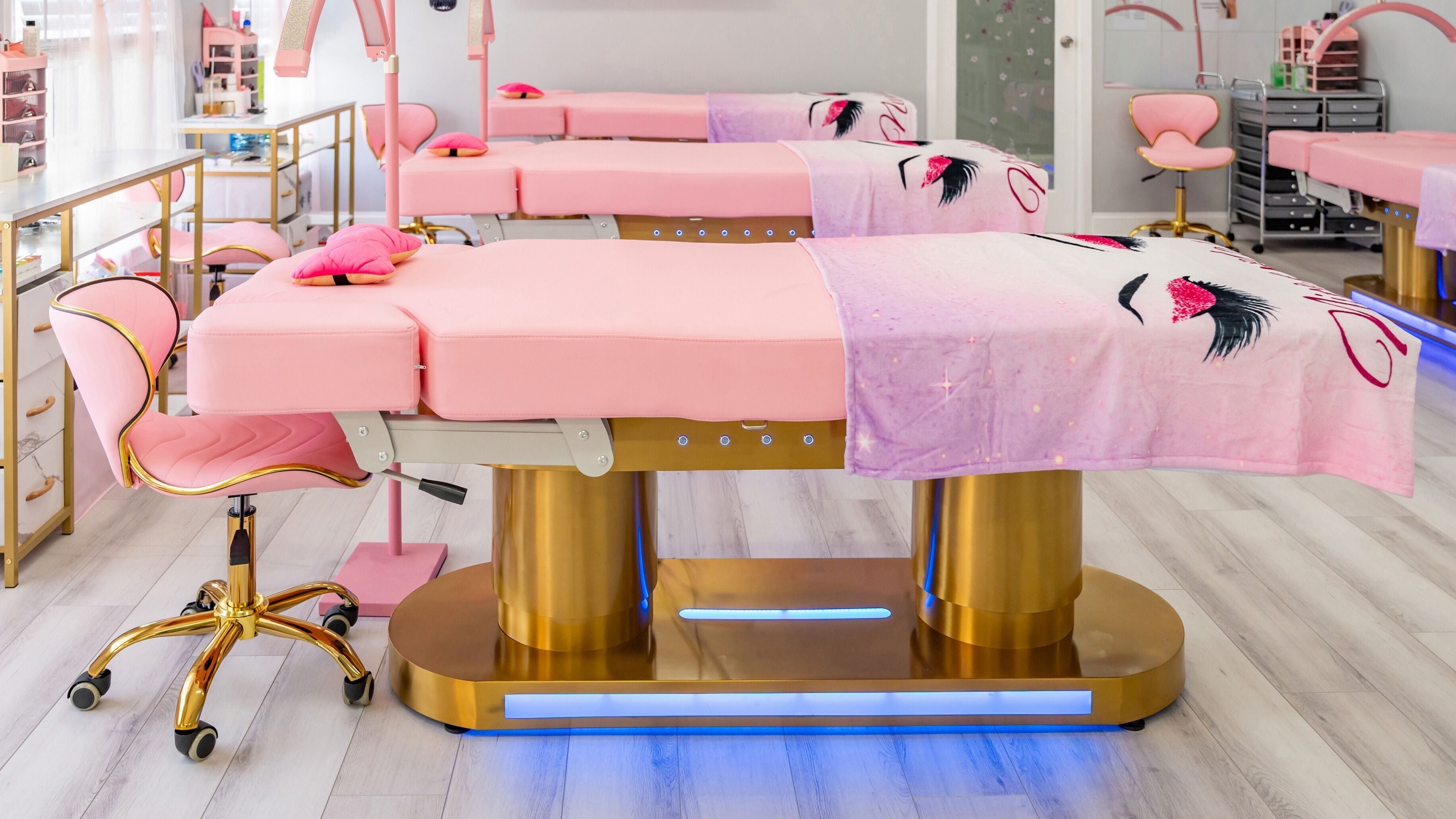 Luxurious pink treatment beds at Lash and Spa By Neda in Vienna, Virginia, US.