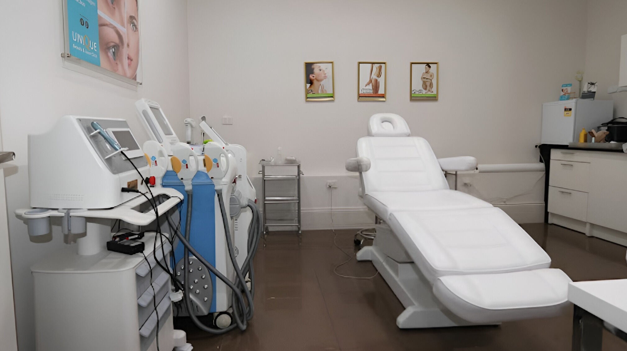 Modern treatment room at Unique Beauty and Laser Clinic in Kilburn, South Australia, AU. Features advanced equipment.