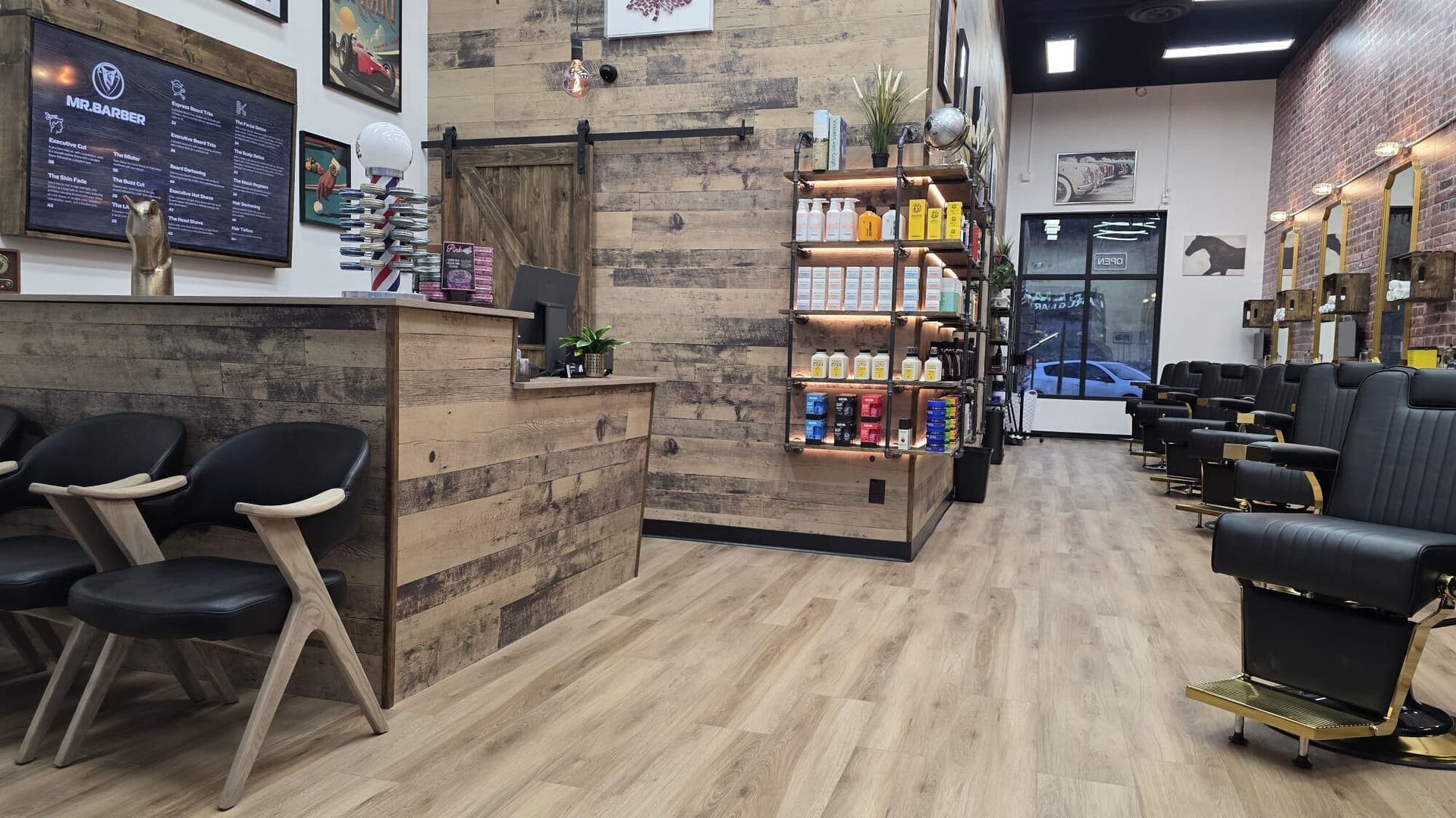 Inside Mr. Barber Jasper Gates with rustic decor, sleek chairs, and shelves in Edmonton, Alberta, CA.