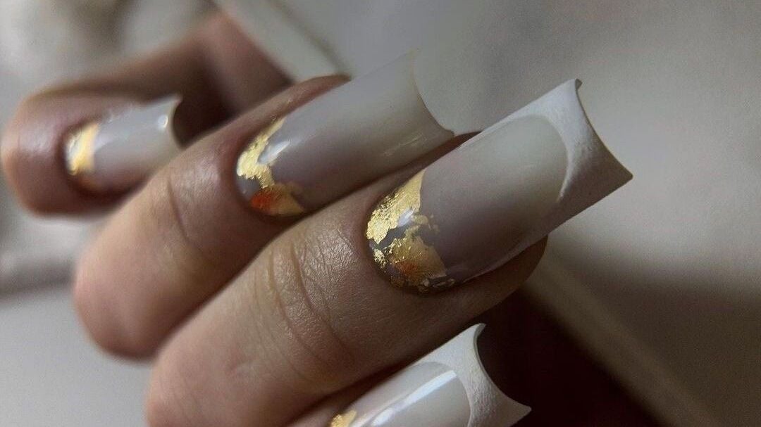 Elegant nail art with gold accents from NAVY in Glasgow, Scotland, GB.