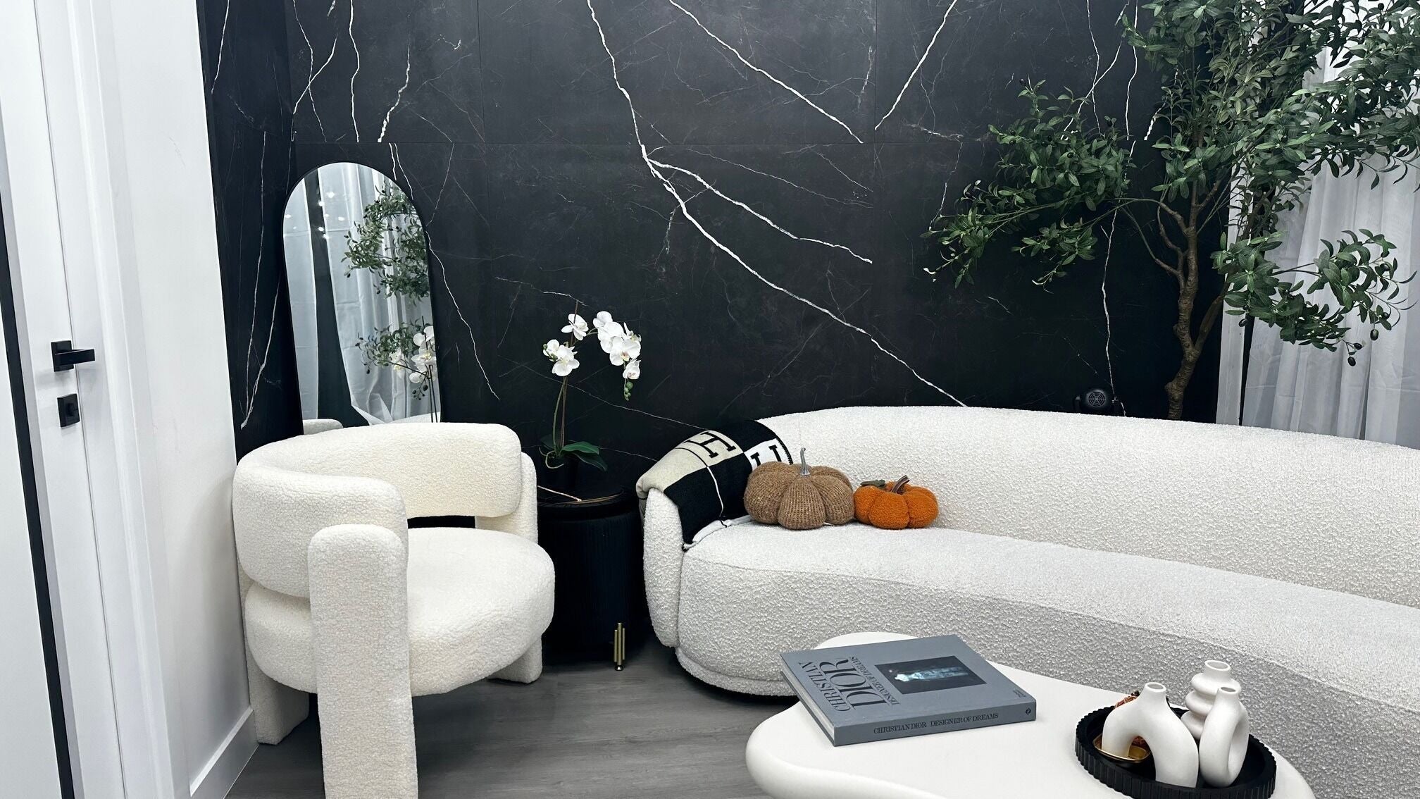 Stylish lounge area at ELEVATE - Marlboro NJ, Englishtown, New Jersey, US with plush seating and elegant decor.