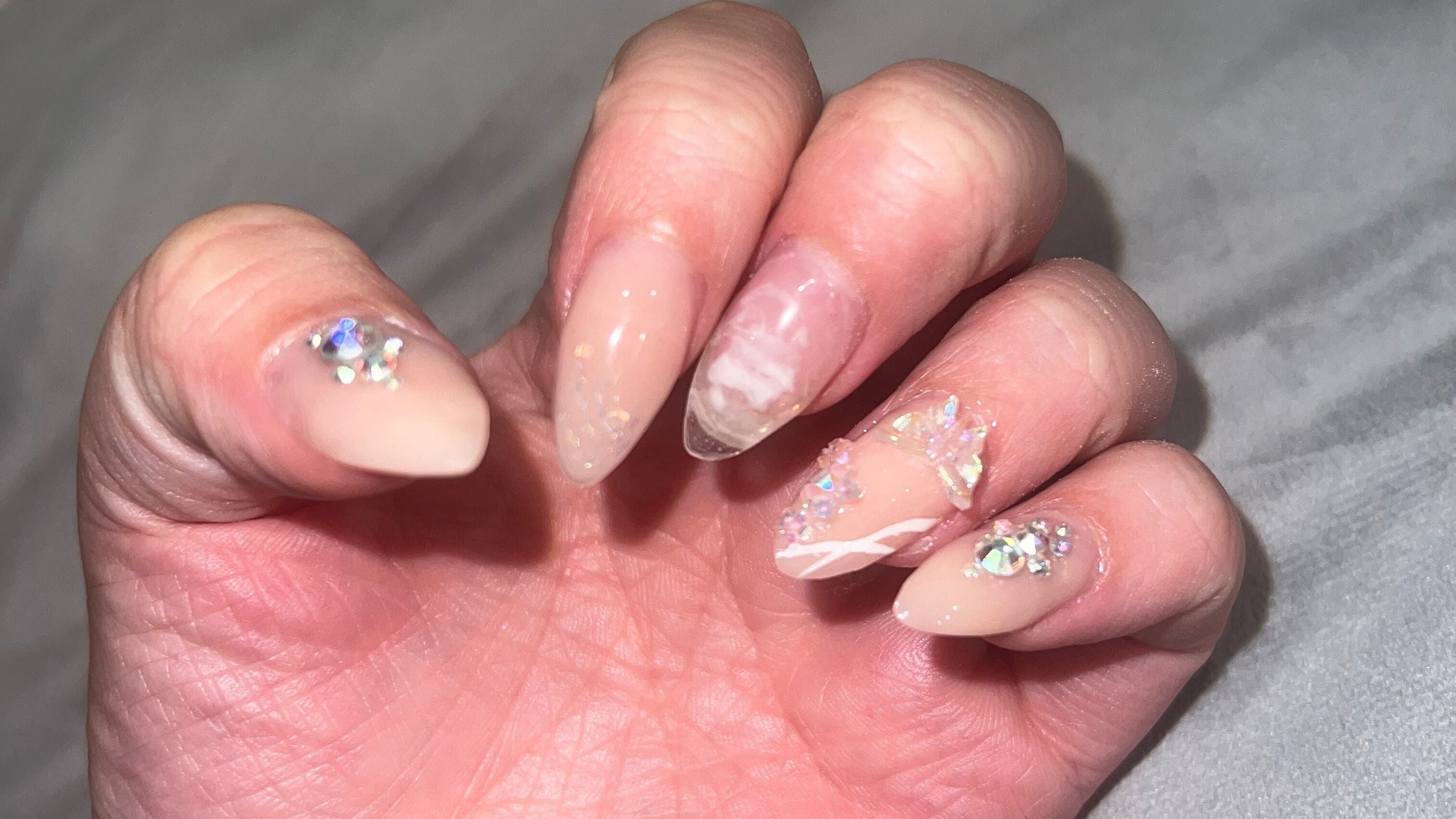 Elegant gel manicure with rhinestones at My Beauty & Skin Clinic, Melbourne, Victoria, AU.