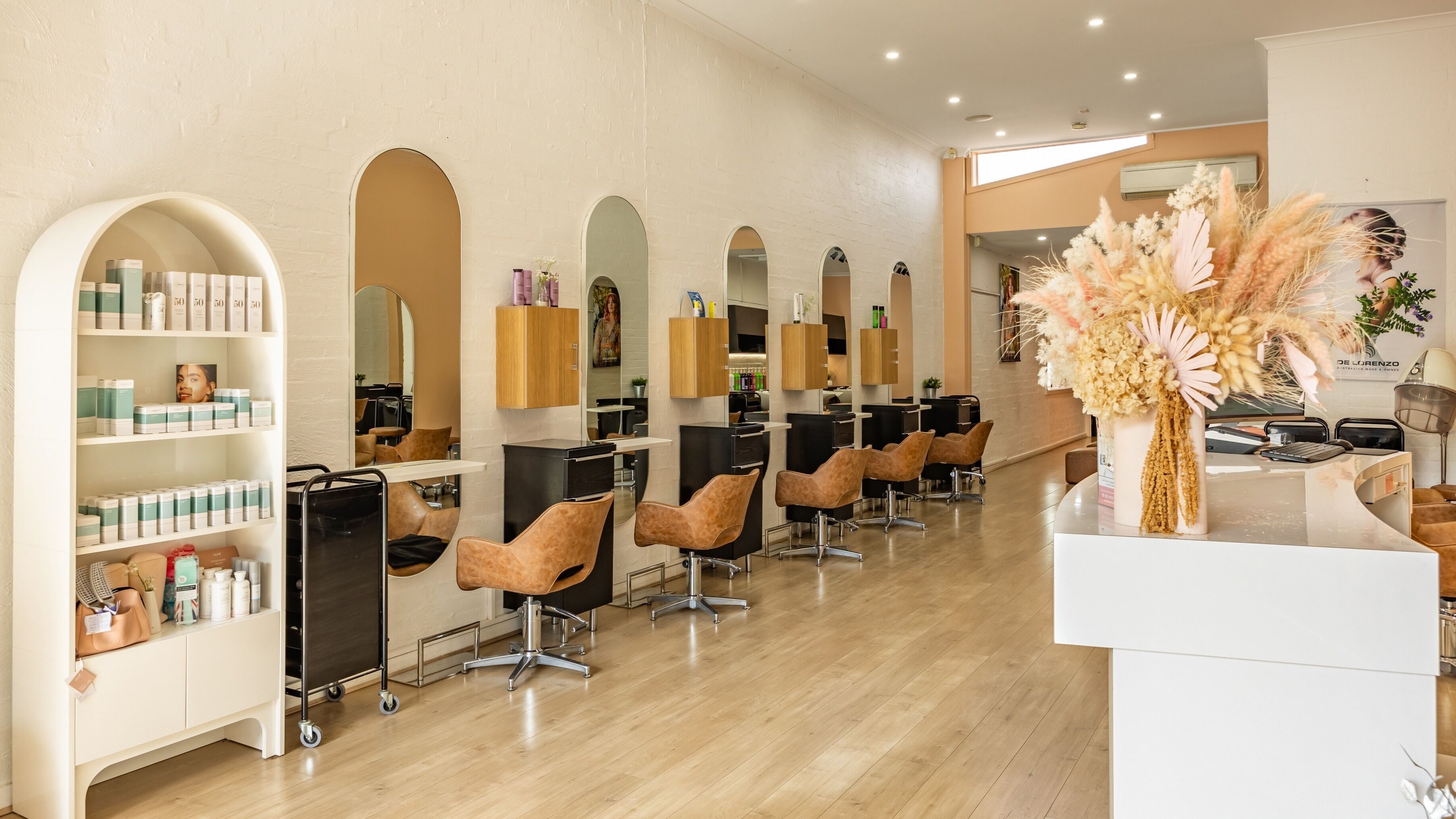 Interior of Volume Bloom Hair Studio in Eltham, Victoria, AU, showcasing chic seating and stylish decor.