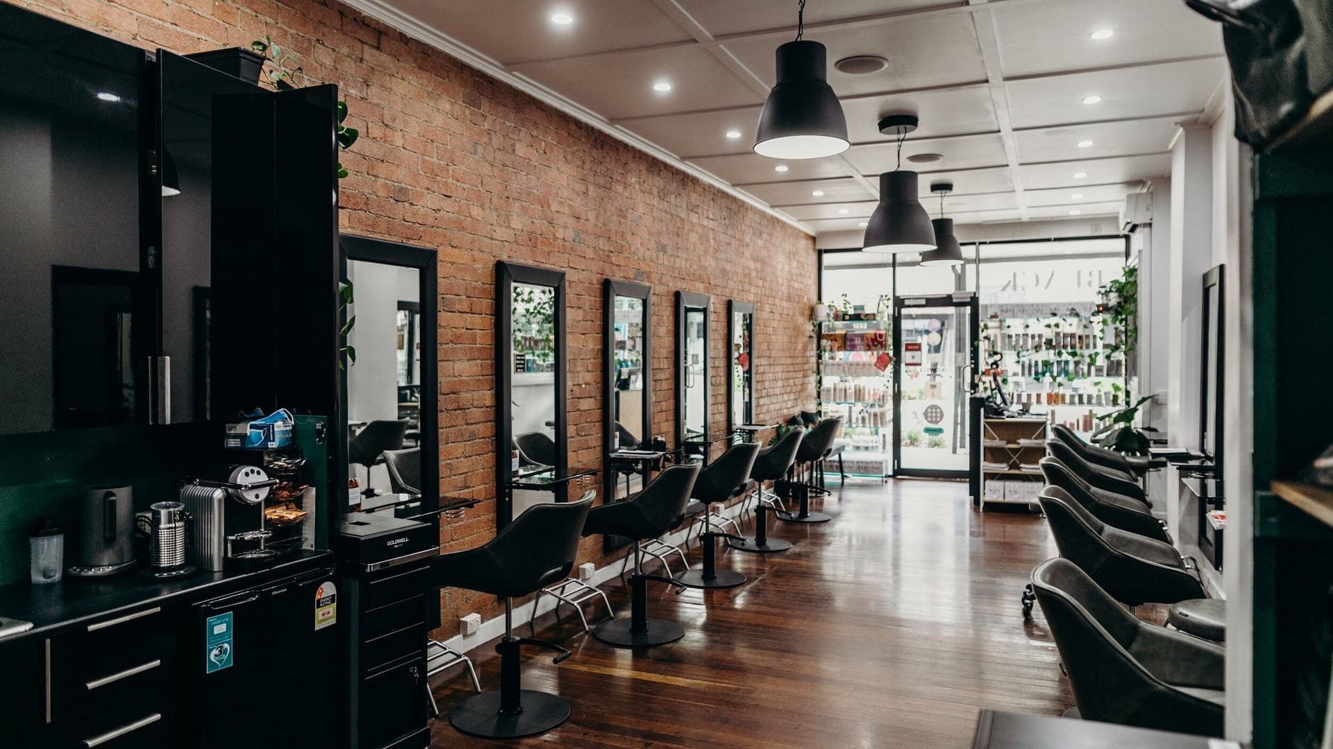 Chic hair styling stations at Black Flamingo Studio, Nundah, Queensland, AU with modern decor.