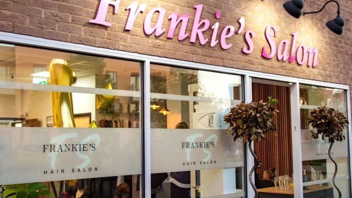 Exterior of ChinmayeeK Nails in Cambridge, England, GB showcasing salon entrance with stylish signage.