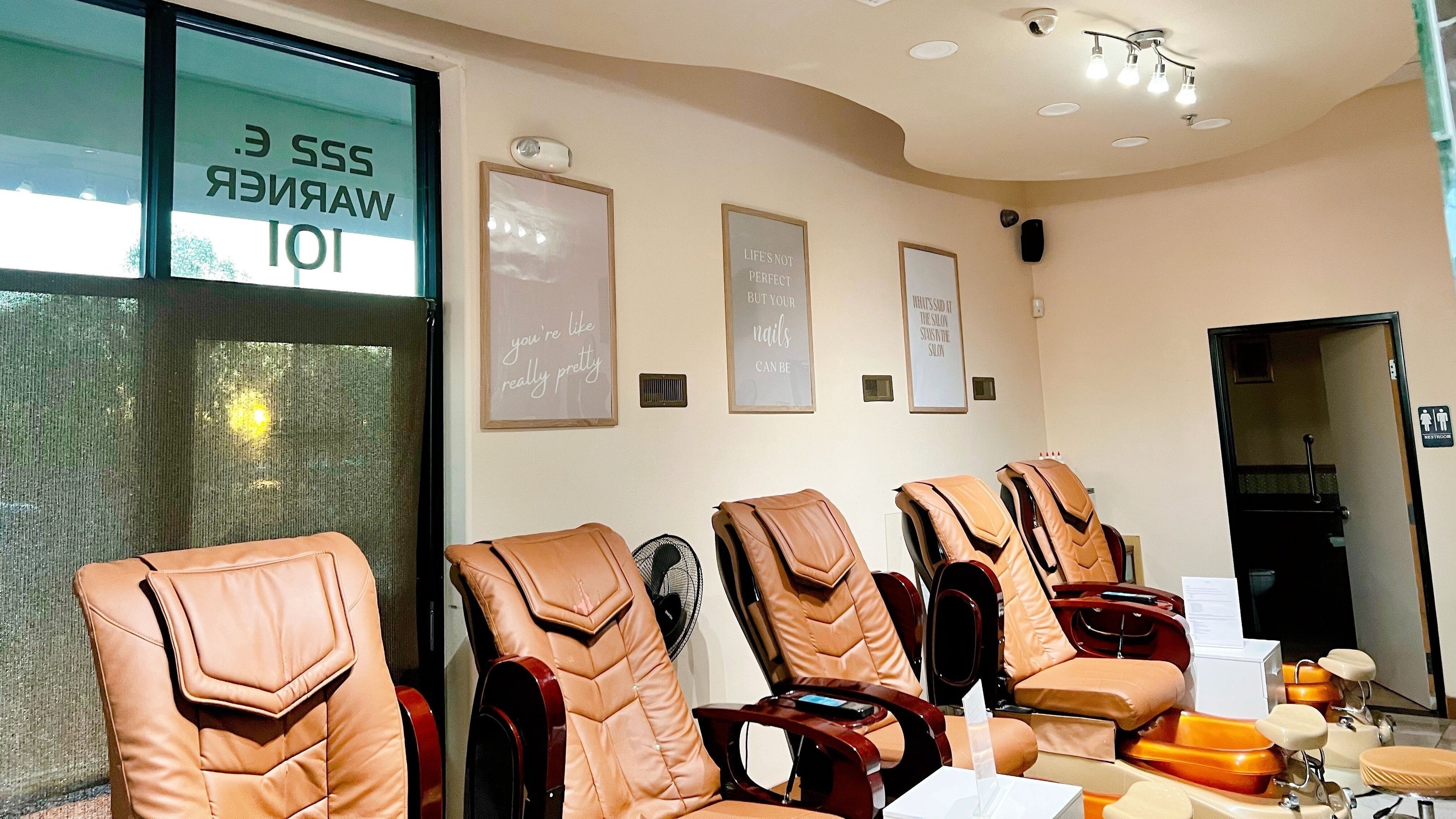 Comfortable pedicure chairs at Bare Lacquer Chandler, Chandler, Arizona, US, inviting relaxation.