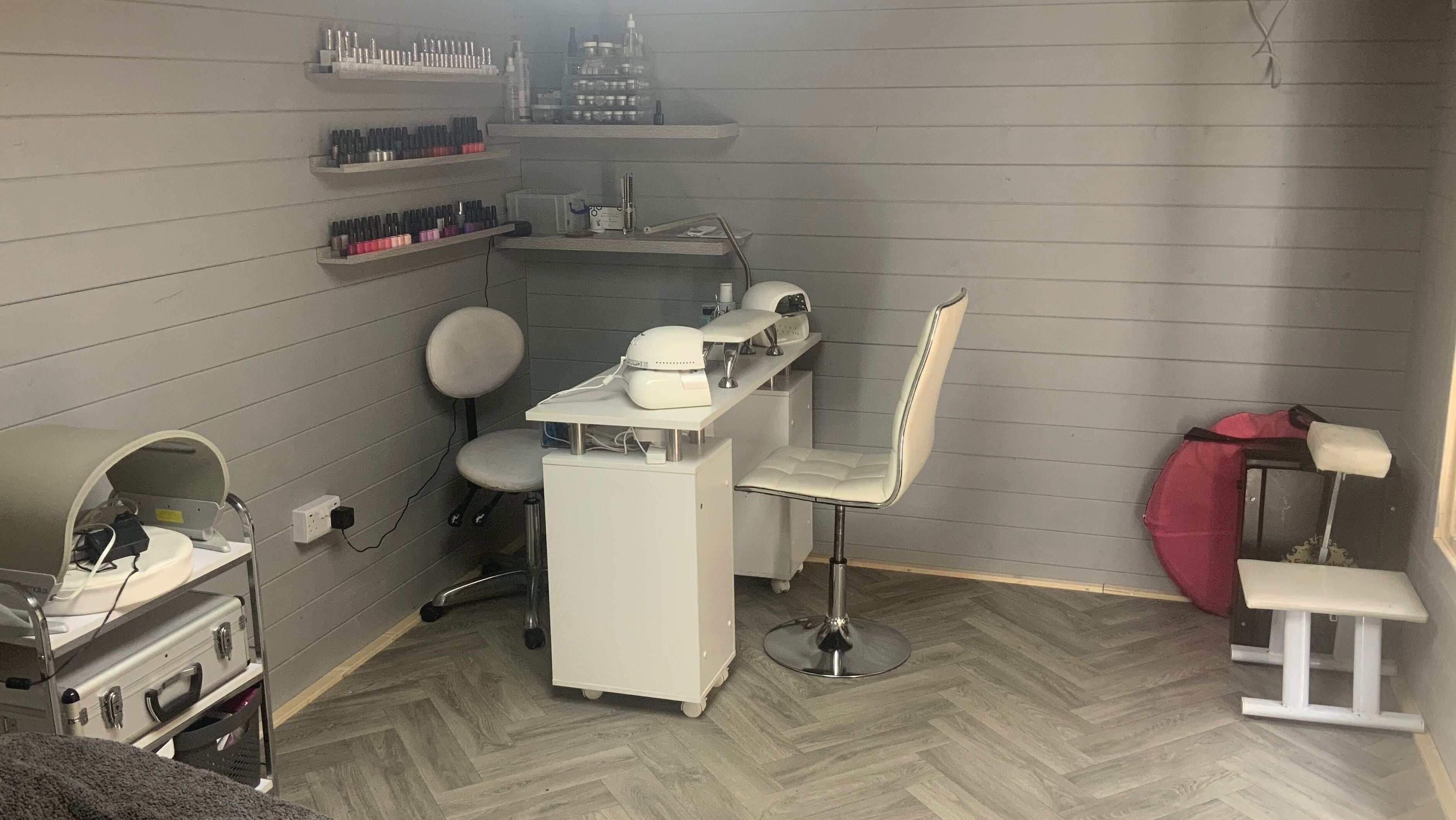Nail salon setup at The Beauty Works & Permanent Make Up, Eastbourne, England, GB. Modern and inviting space.