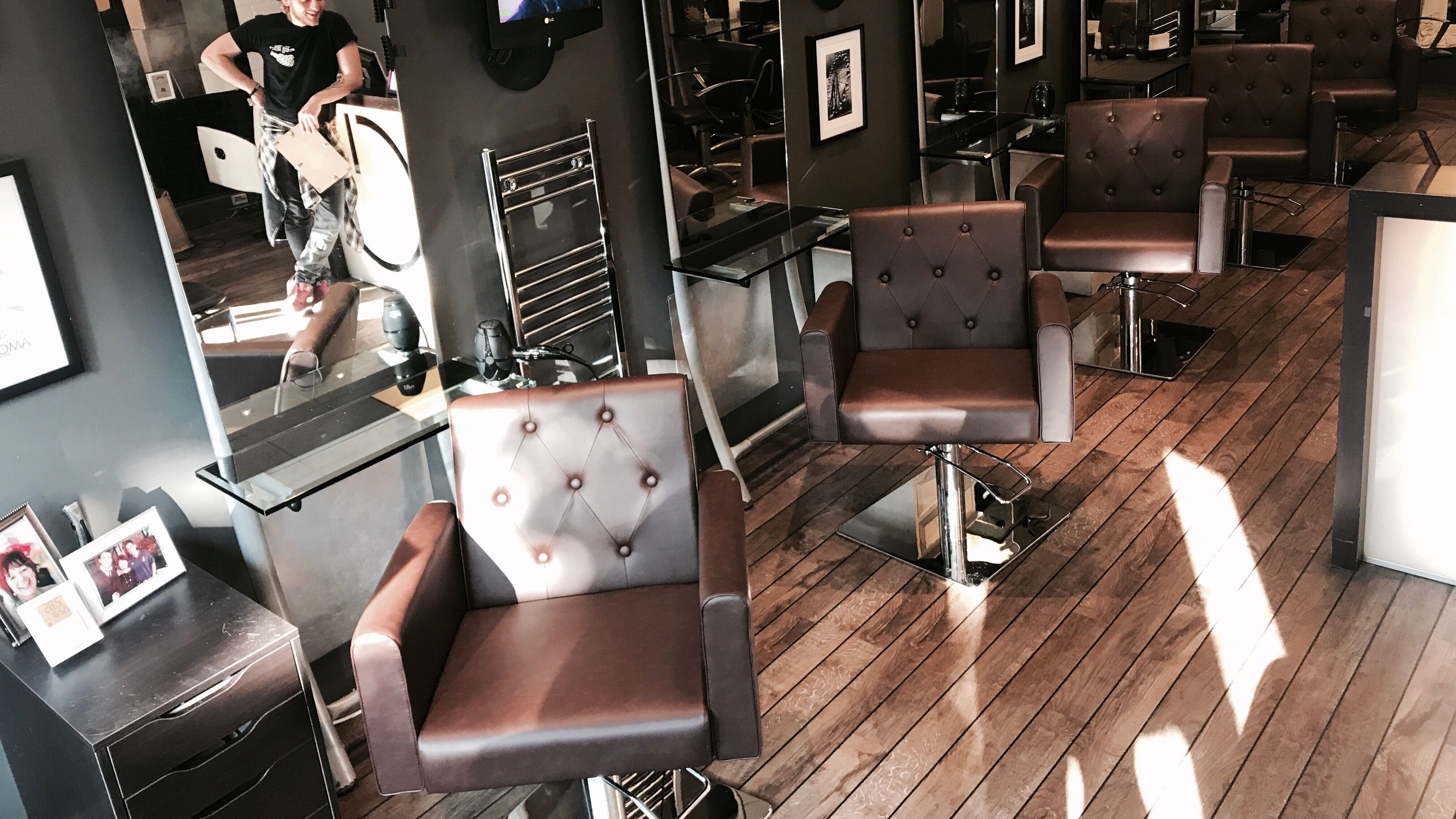 Chic interior of C14 Hair Design by Sam B with stylish chairs in Gloucester, England, GB.