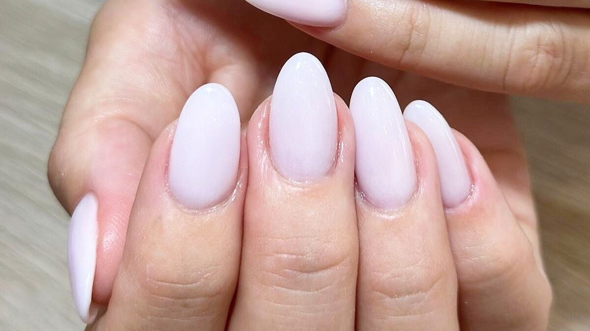 Elegant nails with a soft pink polish at Eden Hair & Nails, Palma, Illes Balears, ES.