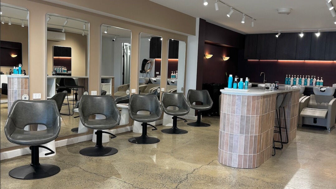 Stylish interior of Mane Character Colour Specialists in Melbourne, Victoria, AU with modern salon chairs.