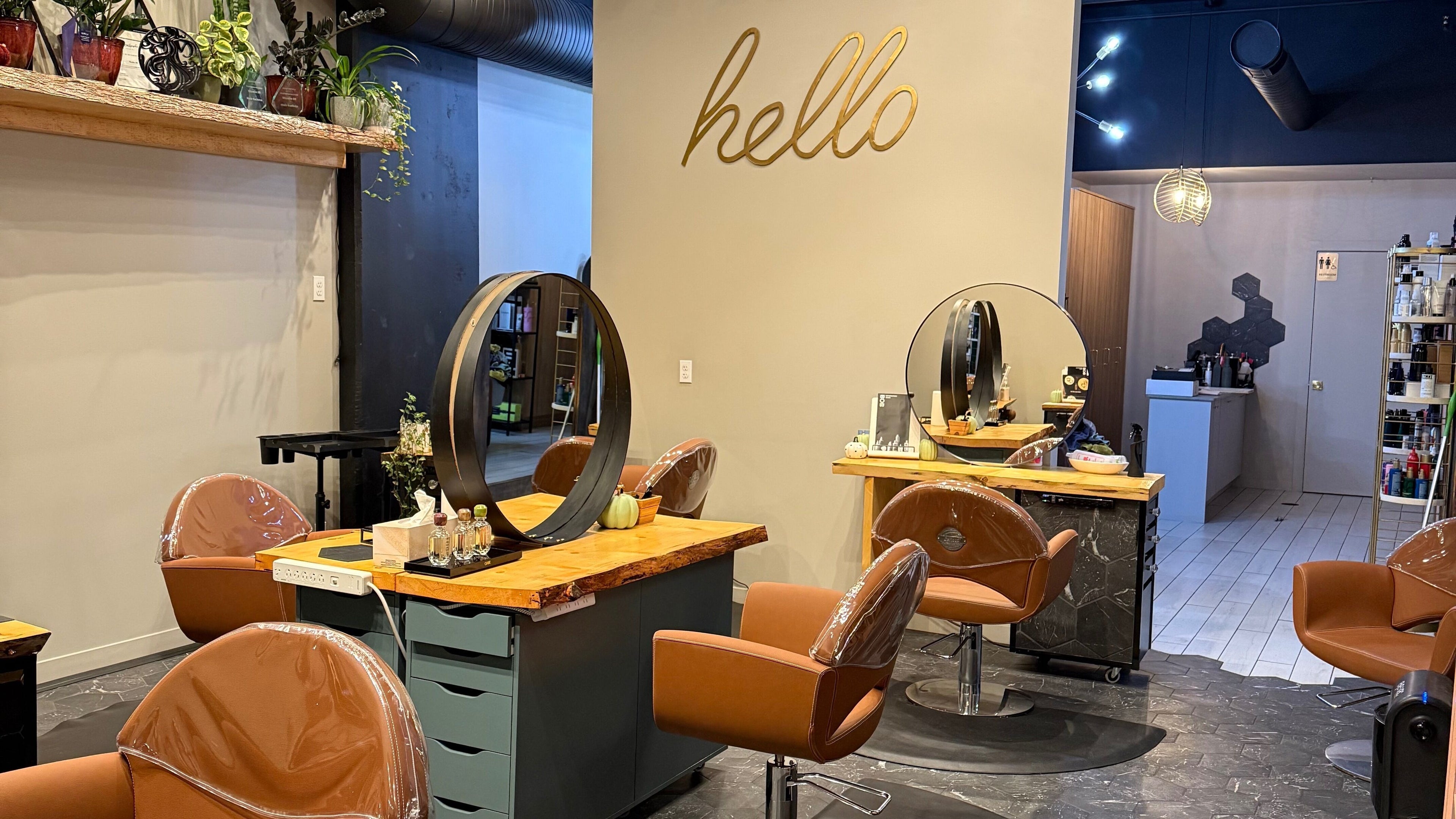 Elegant salon stations at Studio29, Edmonton, Alberta, CA, featuring modern design and plush seating.