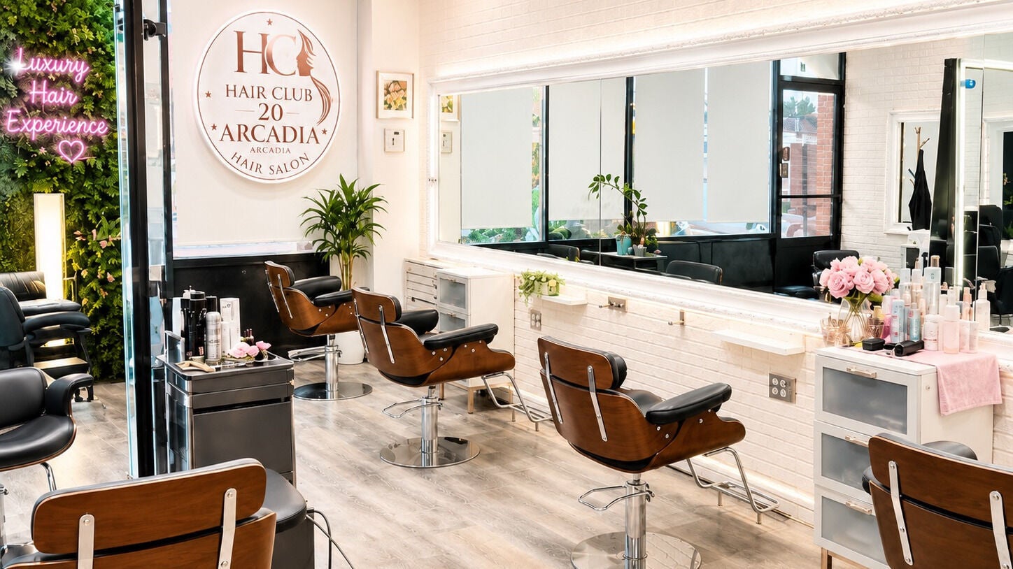 Modern salon interior of Hair Club 20 Arcadia LLC in Arcadia, California, US, showcasing stylish hair stations.