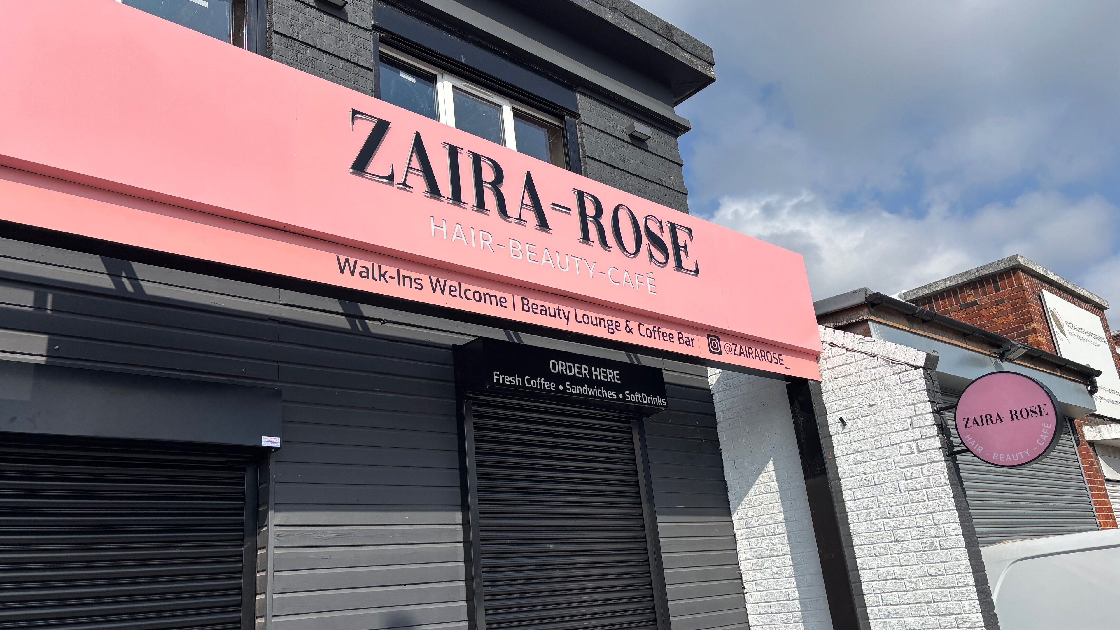 Zaira Rose beauty lounge exterior view in Perivale, England, GB featuring stylish pink signage.