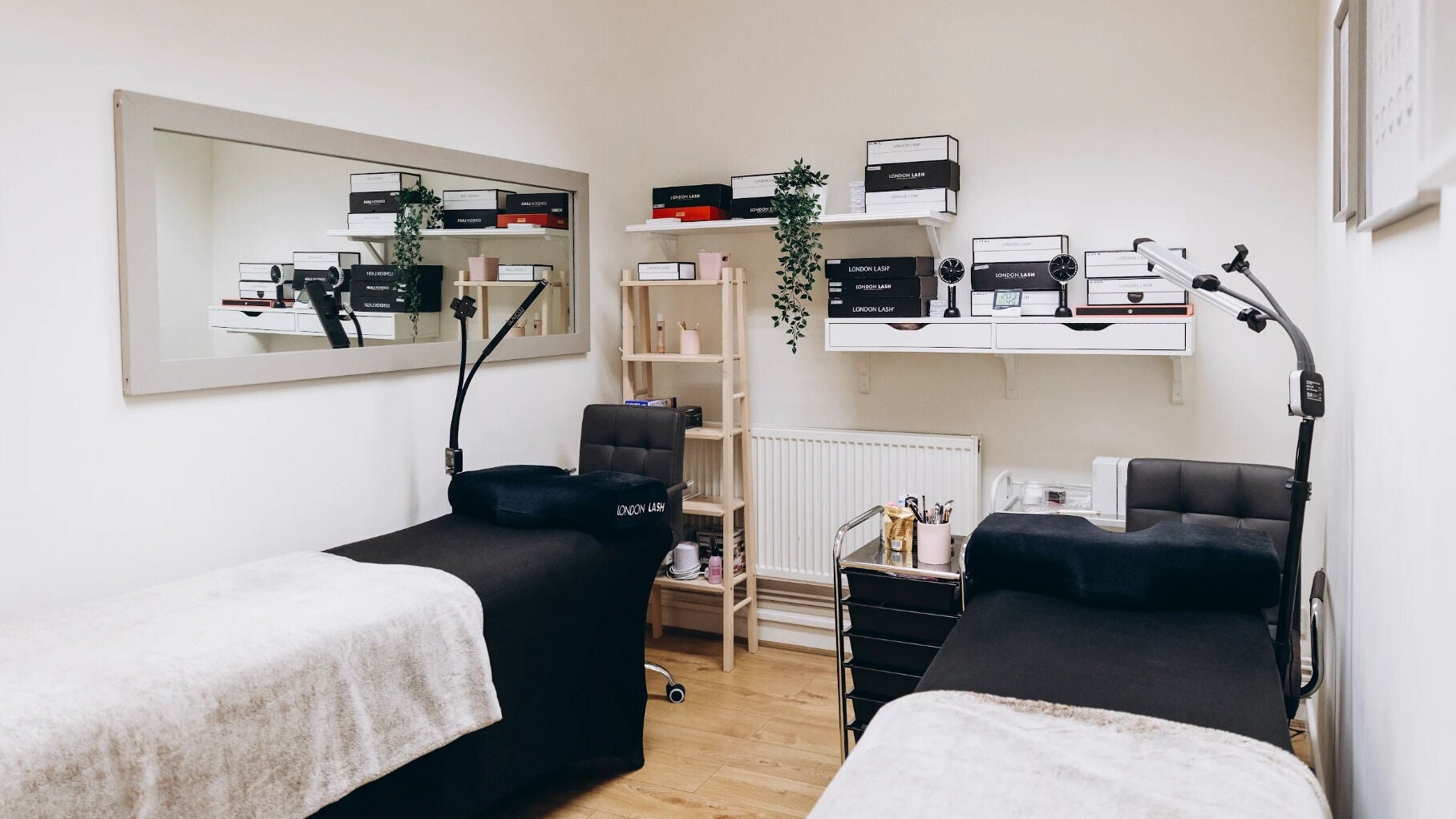 Modern lash treatment room at NeWin Beauty, Kingston Upon Thames, England, GB, with chic decor and lash tools.