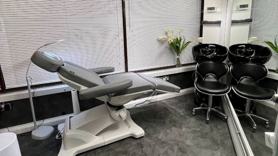 Modern therapy chair and wash station at Beautybase Covent Garden, London, England, GB. Elegantly styled interior.