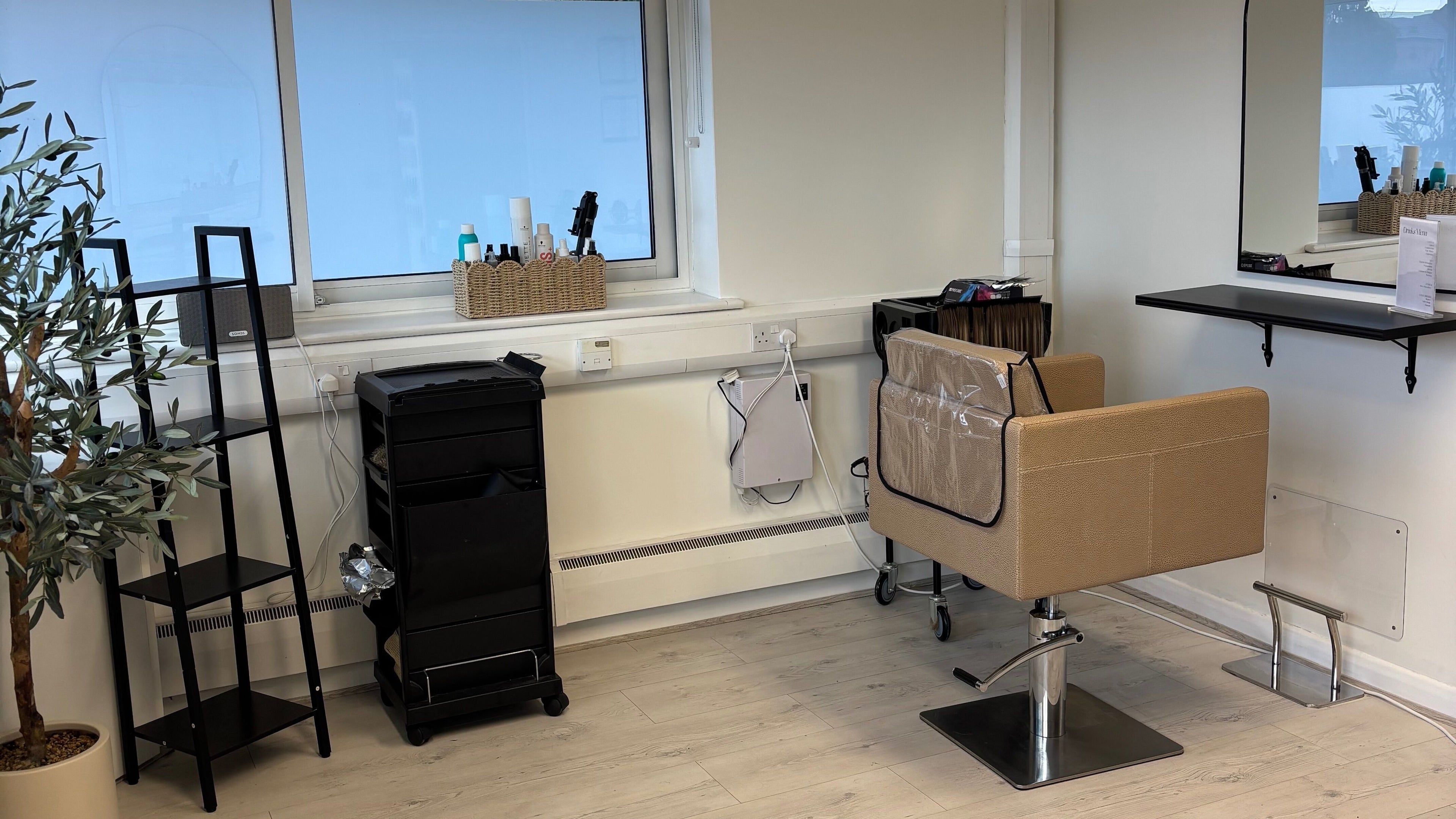 Professional salon setup at Hairbyaliceemma in Hilton, England, GB. Ready for hairstyling.