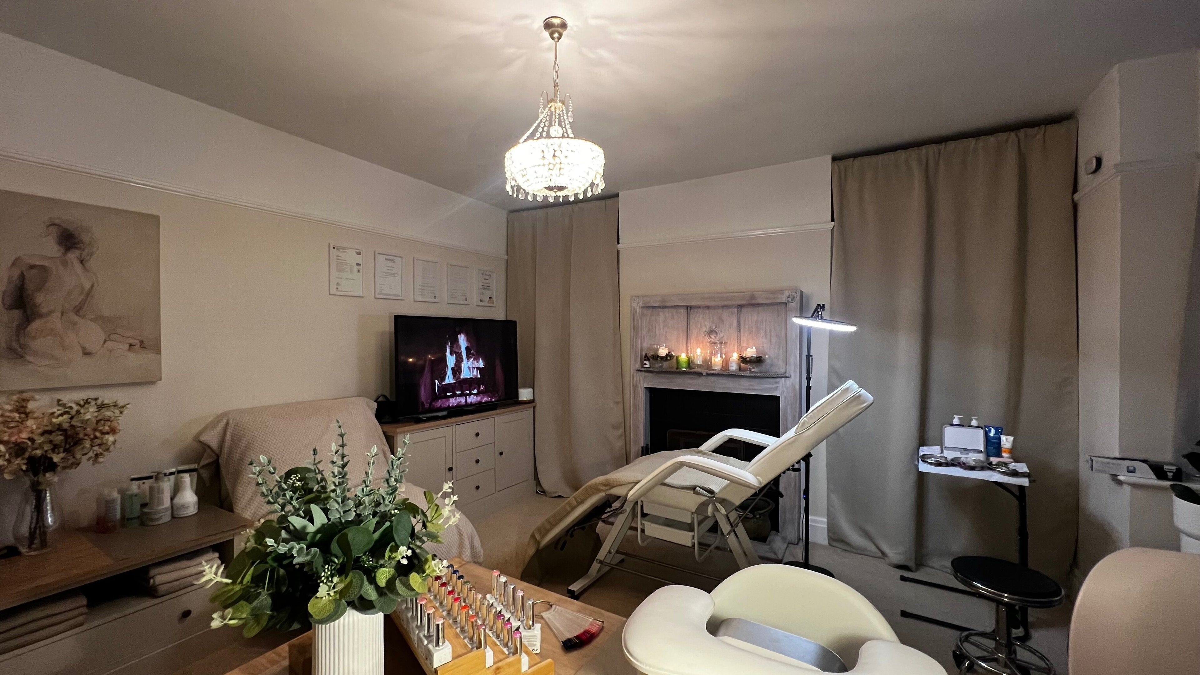 Relaxing treatment room at Lumiere Beauty, Cambridge, England, GB with elegant decor and cozy ambiance.