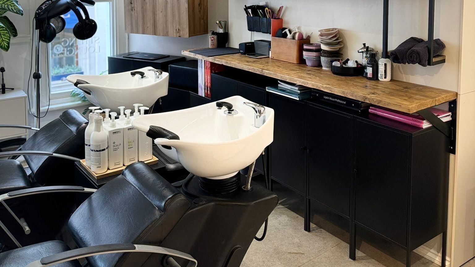 Niamh Monaghan Hair's sleek wash stations in Norwich, England, GB enhance client comfort and style.
