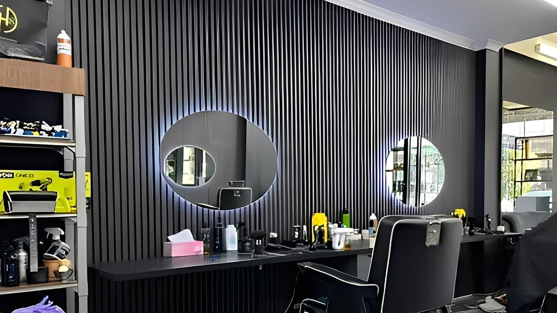 Modern barber chairs and mirrors at Awesome Barbers, Melbourne, Victoria, AU.