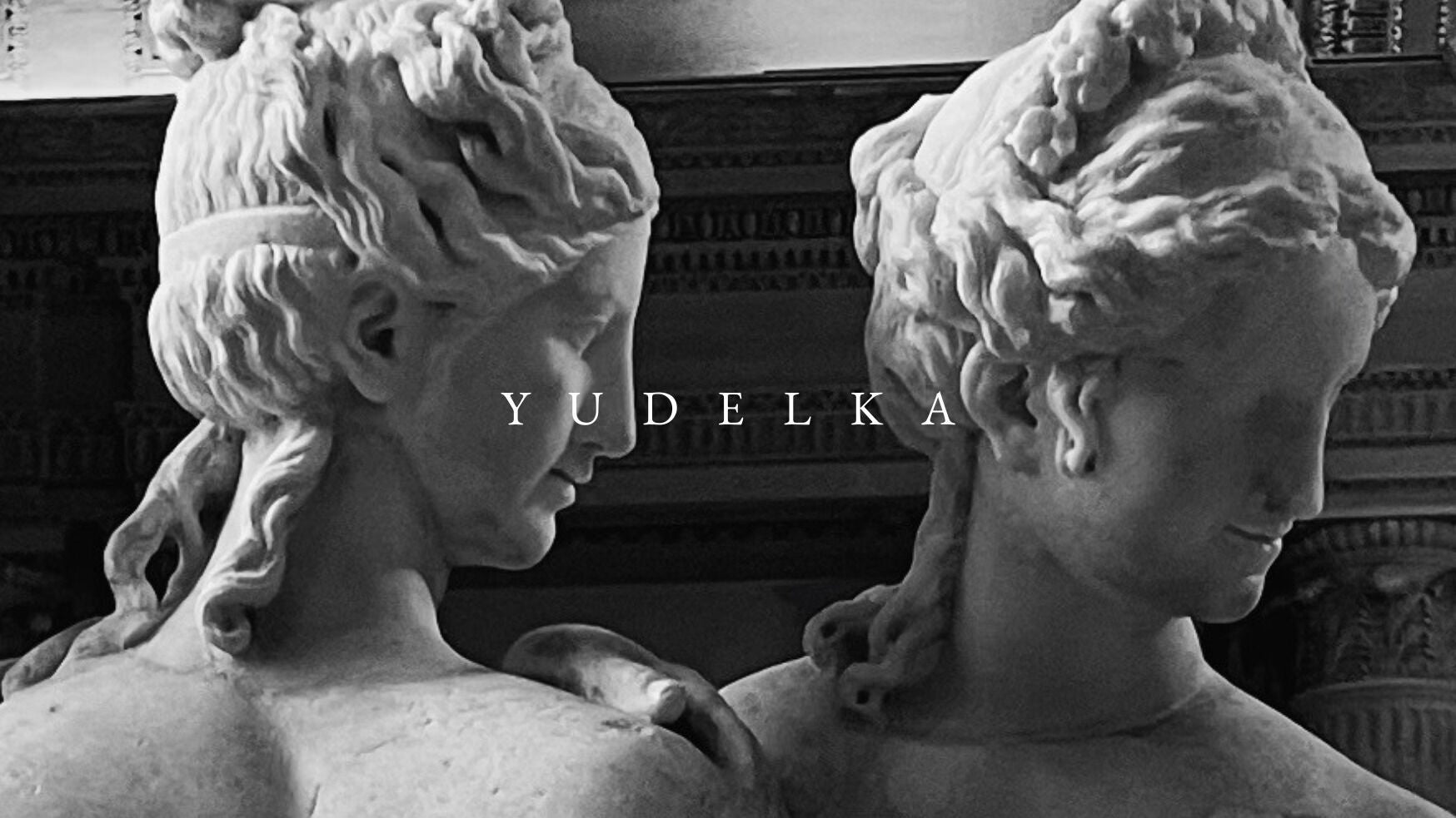 Elegant statues decorating Yudelka Hair in Paris, Île-de-France, FR, enhancing its sophisticated ambiance.